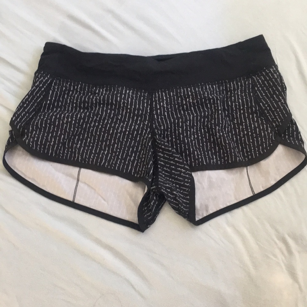 White writing Lululemon athletica shorts size 8